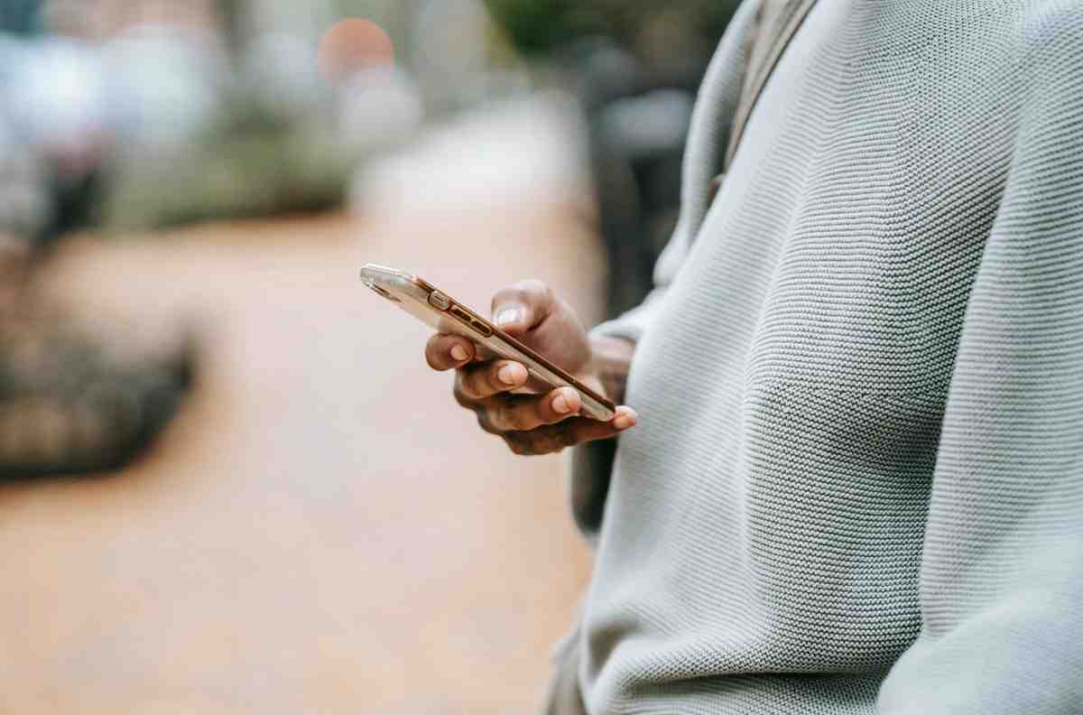 Phone with question marks and SMS verification process explained